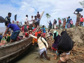 Residents being evacuated in Dhalchar village on the island of Bhola as the Cyclone Amphan barrels towards Bangladesh's coast.