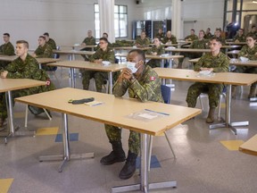 Members of the Canadian Armed Forces take part in a training session before deploying to senior's residences Wednesday April 29, 2020 in Montreal. The Canadian Forces say 36 members working in long-term care homes in Ontario and Quebec have now become sick with COVID-19.