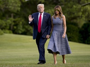 President Donald Trump and first lady Melania Trump return to the White House in Washington, Wednesday, May 27, 2020. Experts say President Donald Trump's bid to defend free expression on the Internet could end up having the opposite effect -- and even put the United States offside in its new trade agreement with Canada and Mexico.