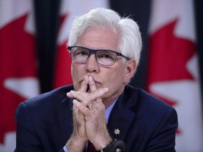 Natural Resources Minister James Carr listens to questions at the National Press Theatre during a press conference in Ottawa on Tuesday, May 29, 2018.