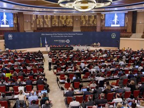 US Secretary of State John Kerry, center-left at podium, delivers a speech to the 28th Meeting of the Parties to the Montreal Protocol on Substances that Deplete the Ozone Layer, in Kigali, Rwanda Friday, Oct. 14, 2016. The Montreal Protocol, which came into force in 1989, banned the use of chemicals that were destroying the ozone layer, which helps protect the planet from damaging solar radiation.