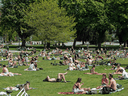 Despite the fact that outdoor areas pose less risk of spreading COVID-19, crowded public beaches, like Kitsilano Beach Park in Vancouver, are a different story, says Dr. Ali S. Raja.