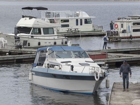 Boats get launched at Kawartha Lakes Marina in Bobcaygeon, Ont. on Saturday, May 16, 2020.