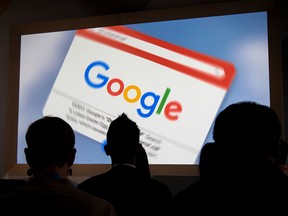 Attendees watch a presentation during a Google Inc. 20th anniversary event in San Francisco, Calif., on Sept. 24, 2018.
