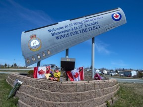 A memorial is seen at 12 Wing Shearwater in Dartmouth, N.S., home of 423 Maritime Helicopter Squadron, on Thursday, April 30, 2020. A CH-148 Cyclone helicopter flying from the Halifax-class frigate HMCS Fredericton crashed in the Ionian Sea between Italy and Greece while taking part in an exercise as part of a NATO operation in the Mediterranean.