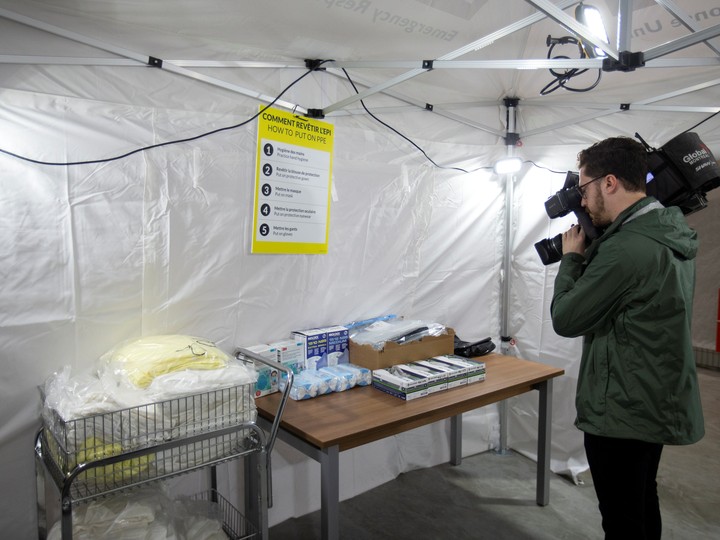  A member of the media tours a mobile hospital set up in partnership with the Canadian Red Cross in the Jacques-Lemaire Arena to help care for patients with the coronavirus disease (COVID-19) from long-term centres (CHSLDs), in Montreal, Quebec, Canada April 26, 2020.