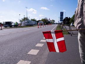 People attend a demonstration to reopen the border with Germany, after it was closed  to prevent the spread of COVID-19, at the border crossing at Saed, near Toender, Denmark May 17, 2020.