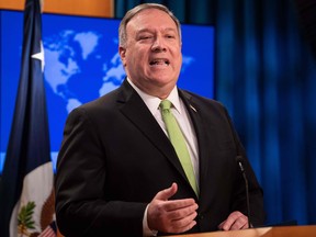 In this file photo taken on May 20, 2020, US Secretary of State Mike Pompeo speaks the press at the State Department in Washington, DC, on May 20, 2020.