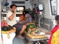 People affected by a gas leak at the LG Polymers Plant are transported in a ambulance in Visakhapatnam, India, May 7, 2020.