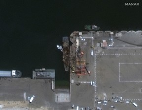 A satellite image shows the Iranian vessel Konarak, centre, which was damaged in a friendly-fire missile incident at the Jask port, in southern Hormozgan province, Iran, on May 11, 2020.