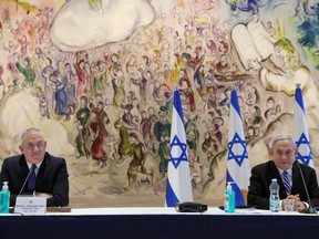 Why Israel — a desert country surrounded by enemies — is outperforming other countries - Breaking News Israeli Prime Minister Benjamin Netanyahu, right, and Defence Minister Benny Gantz attend a cabinet meeting in the Knesset in Jerusalem on May 24, 2020.