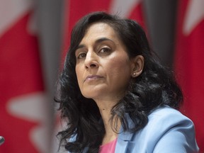 Public Services and Procurement Minister Anita Anand listens to a question during a news conference in Ottawa on April 16, 2020. The federal government has suspended shipments of N95 masks from a Montreal-based supplier after about eight million masks made in China failed to meet specifications. The office of Procurement Minister Anita Anand says that of the close to 11 million masks received from the distributor, about one million met federal standards while another 1.6 million masks are in the process of being tested.