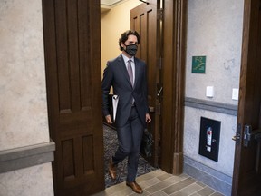 Prime Minister Justin Trudeau arrives in the foyer of the House of Commons on Parliament Hill for a meeting of the Special Committee on the COVID-19 Pandemic in Ottawa, on Wednesday, May 27, 2020.