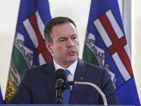 Alberta Premier Jason Kenney speaks during a press conference in Edmonton on February 24, 2020. Premier Jason Kenney says Alberta and the federal government will cost share a $42-million program to help farmers and ranchers deal with backlogs of cattle during the COVID-19 pandemic.