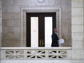 Manitoba premier Brian Pallister makes his way to question period at the Manitoba Legislature in Winnipeg, Wednesday, May 13, 2020.
