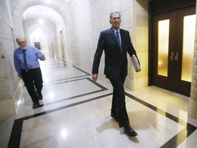 Manitoba Premier Brian Pallister does not respond to a reporter's question as he makes his way to question period at the Manitoba Legislature in Winnipeg, Wednesday, May 13, 2020.
