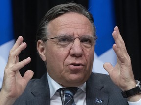 Quebec Premier Francois Legault responds to reporters during a news conference on the COVID-19 pandemic, Tuesday, May 19, 2020 at the legislature in Quebec City.