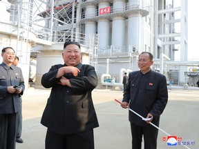 North Korean leader Kim Jong Un attends the completion of a fertiliser plant, in a region north of the capital, Pyongyang, in this image released by North Korea's Korean Central News Agency (KCNA) on May 2, 2020.