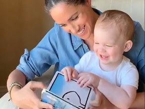 Meghan, Duchess of Sussex reading from the book Duck! Rabbit! to their son Archie, on his first birthday.