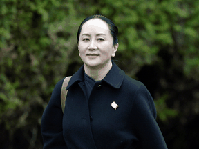 Huawei Chief Financial Officer Meng Wanzhou leaves her home to attend her extradition hearing at B.C. Supreme Court in Vancouver, on Jan. 22, 2020.