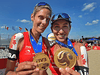 Sarah Pavan, left, and Melissa Humana-Paredes hold their Edmonton Open gold medals last July.