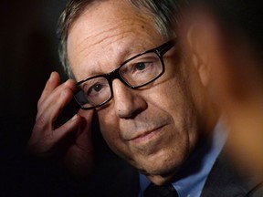 Liberal MP Irwin Cotler holds a press conference in the foyer of the House of Commons in Ottawa on March 26, 2015. Canada's quest for compensation from Iran for shooting down a Ukrainian airliner is fraught with obstacles because Tehran's lead investigator is a mass executioner who belongs in prison, says a former justice minister.