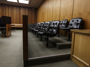 A jury box is shown in a courtroom at the Edmonton Law Courts building in Edmonton on Friday, June 28, 2019. An Edmonton criminal law firm says COVID-19 restrictions in Alberta's courthouses have led to an untenable situation.