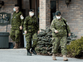 Members of the Canadian Armed Forces work at Residence Villa Val des Arbres a long-term care home in Laval, Quebec.