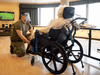A Canadian soldier aids a resident at the Vigi Queen Elizabeth care centre in Montreal.