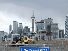 Construction equipment parked on a waterfront work site in Toronto after Alphabet's Sidewalk Labs announced it pulled out of the neighbouring "smart city" project due to economic uncertainty, May 7, 2020.