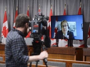 Minister of Environment and Climate Change Jonathan Wilkinson speaks via video link during a press conference on Parliament Hill during the COVID-19 pandemic in Ottawa on Thursday, May 14, 2020.