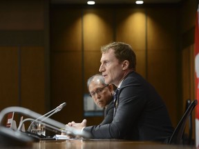 Minister of Indigenous Services Marc Miller, right, and Dr. Tom Wong, Chief Medical Officer of Public Health at Indigenous Services Canada, take part in a press conference on Parliament Hill amid the COVID-19 pandemic in Ottawa on Friday, May 29, 2020.