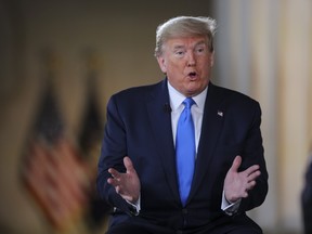 U.S. President Donald Trump gestures as he speaks during a Fox News town hall at the Lincoln Memorial in Washington, D.C., U.S., on Sunday, May 3, 2020. Trump holds a symbolic town hall meeting at the Lincoln Memorial Sunday as he accelerates efforts to reopen America after weeks of stay-at-home measures taken to stem coronavirus spread have ravaged the economy.