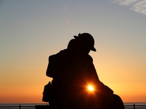The statue of soldier "Tommy", a war statue by artist Ray Lonsdale, is seen during sunrise on the 75th anniversary of VE-Day, in Seaham, Britain, on May 8.