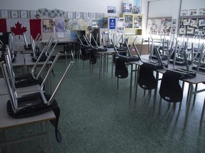 A empty classroom is pictured at Eric Hamber Secondary school in Vancouver, B.C. Monday, March 23, 2020.