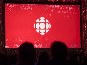 The CBC logo is projected on a screen during the broadcaster's annual upfront presentation in Toronto, in 2019. CBC