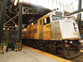 A file photo of a Via Rail train sitting on tracks at Union Station.