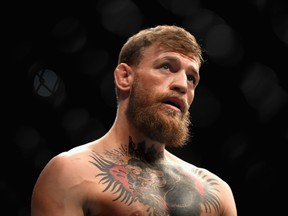 Conor McGregor of Ireland looks on in the octagon before competing against Khabib Nurmagomedov of Russia in their UFC lightweight championship bout during the UFC 229 event inside T-Mobile Arena on October 6, 2018 in Las Vegas, Nevada.