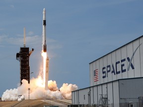 A SpaceX Falcon 9 rocket and Crew Dragon spacecraft carrying NASA astronauts Douglas Hurley and Robert Behnken lifts off during NASA's SpaceX Demo-2 mission to the International Space Station from NASA's Kennedy Space Center in Cape Canaveral, Florida, U.S., May 30, 2020.