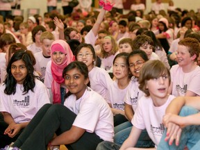 Staff and students at Cedarview Middle School in Ottawa take part in a flash mob dance in the school's gymnasium to speak up against bullying, racism and homophobia in 2011.
