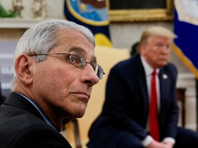 National Institute of Allergy and Infectious Diseases Director Dr. Anthony Fauci attends a coronavirus response meeting between U.S. President Donald Trump and Louisiana Governor John Bel Edwards in the Oval Office at the White House in Washington, U.S., April 29, 2020.