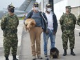 Daniel Guggenheim of Switzerland and Jose Alburqueque of Brazil speak to the media during a news conference at a military base in Bogota, after Colombian forces rescued them following their kidnapping in Cauca region by dissidents of the Revolutionary Armed Forces of Colombia (FARC), in Bogota, Colombia June 18, 2020.