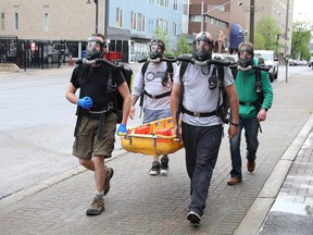 A Vale mine rescue team participates in a training session in downtown Sudbury on Friday May 29, 2020.