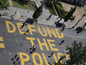 "Defund The Police" is seen painted on a street near the White House in Washington, D.C., on June 08.
