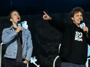 WE co-founders Craig and Marc Kielburger speak during WE Day Alberta at Rogers Place in Edmonton, on Oct. 22, 2019.