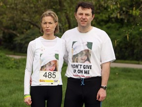 Kate and Gerry McCann, whose daughter Madeline McCann vanished while on a family holiday in Portugal almost four years ago, pose before the start of the "Miles for Missing People" charity run in Regent's Park, central London,  April 2, 2011.