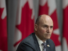 President of the Treasury Board Jean-Yves Duclos listens to a speaker during a news conference Tuesday June 16, 2020 in Ottawa. The Trudeau government is inviting Canadians to say what they think of the federal law that allows the public to request information from departments and agencies.THE CANADIAN PRESS/Adrian Wyld