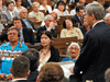 Residential school victims listen to Prime Minister Stephen Harper officially apologize for more than a century of abuse and cultural loss involving Indian residential schools at a ceremony in the House of Commons, June 11, 2008.