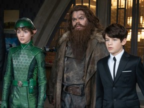 From left, Lara McDonnell, Josh Gad and Ferdia Shaw take in the weirdness in Artemis Fowl.