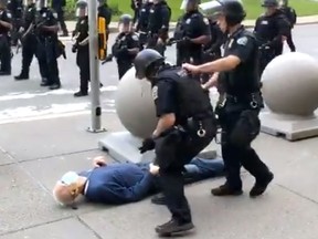 Two police officers in Buffalo, New York, were charged with assault after protester Martin Gugino, 75, was shoved hard and fell straight backwards after approaching an advancing line of police in helmets and body armor. Video showed blood pooling under the back of his head as he lay motionless. He is still in hospital.